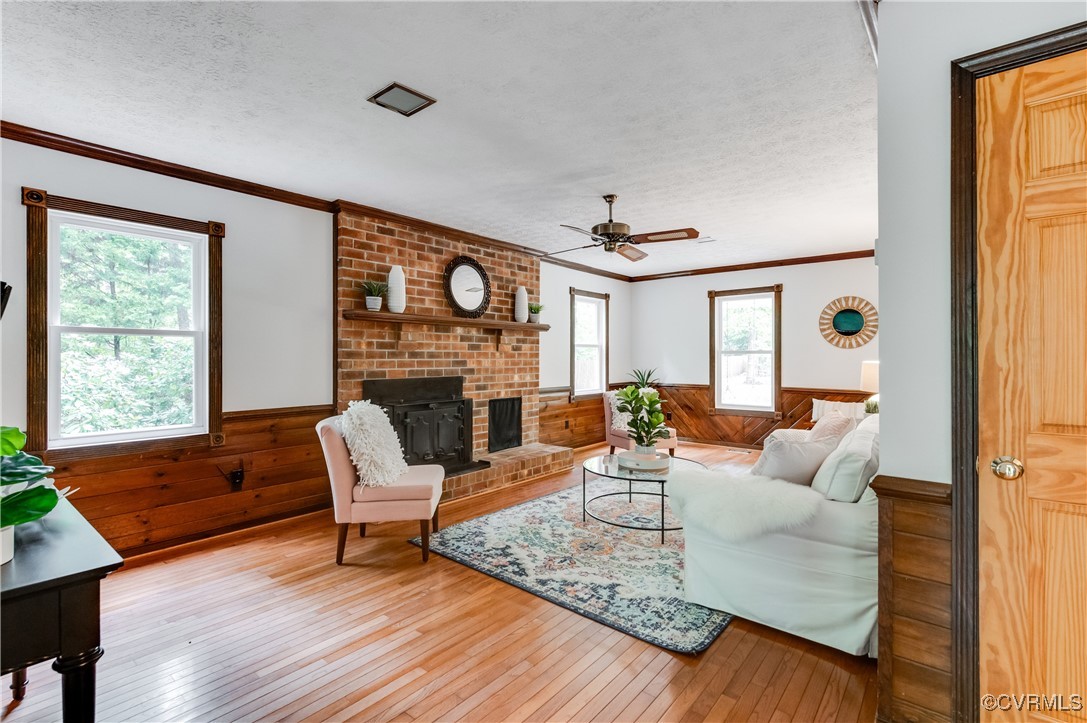 13321 Hensley Road Chesterfield, VA 23832 - Photo 7 of 48 a living room with furniture and a fireplace