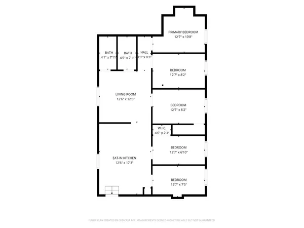 a picture of a rug with a white wall