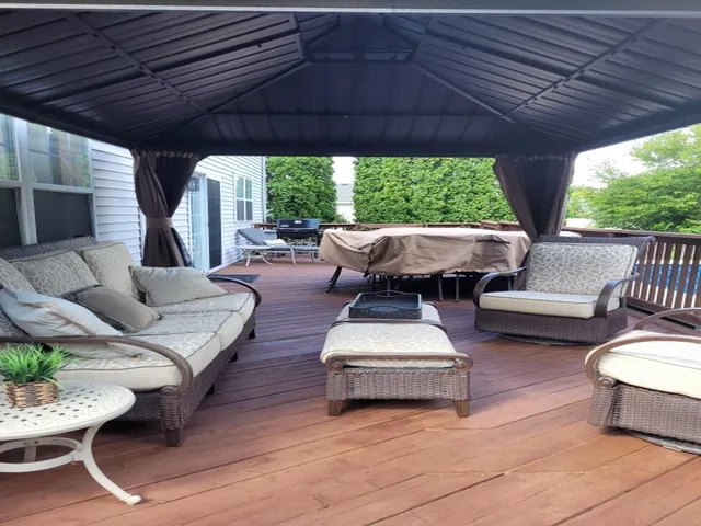a outdoor living space with furniture and garden view