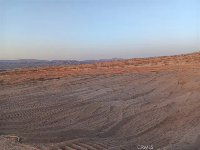 a view of wooden floor and white walls