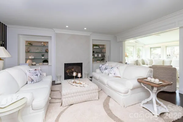 a living room with a couch and a fireplace