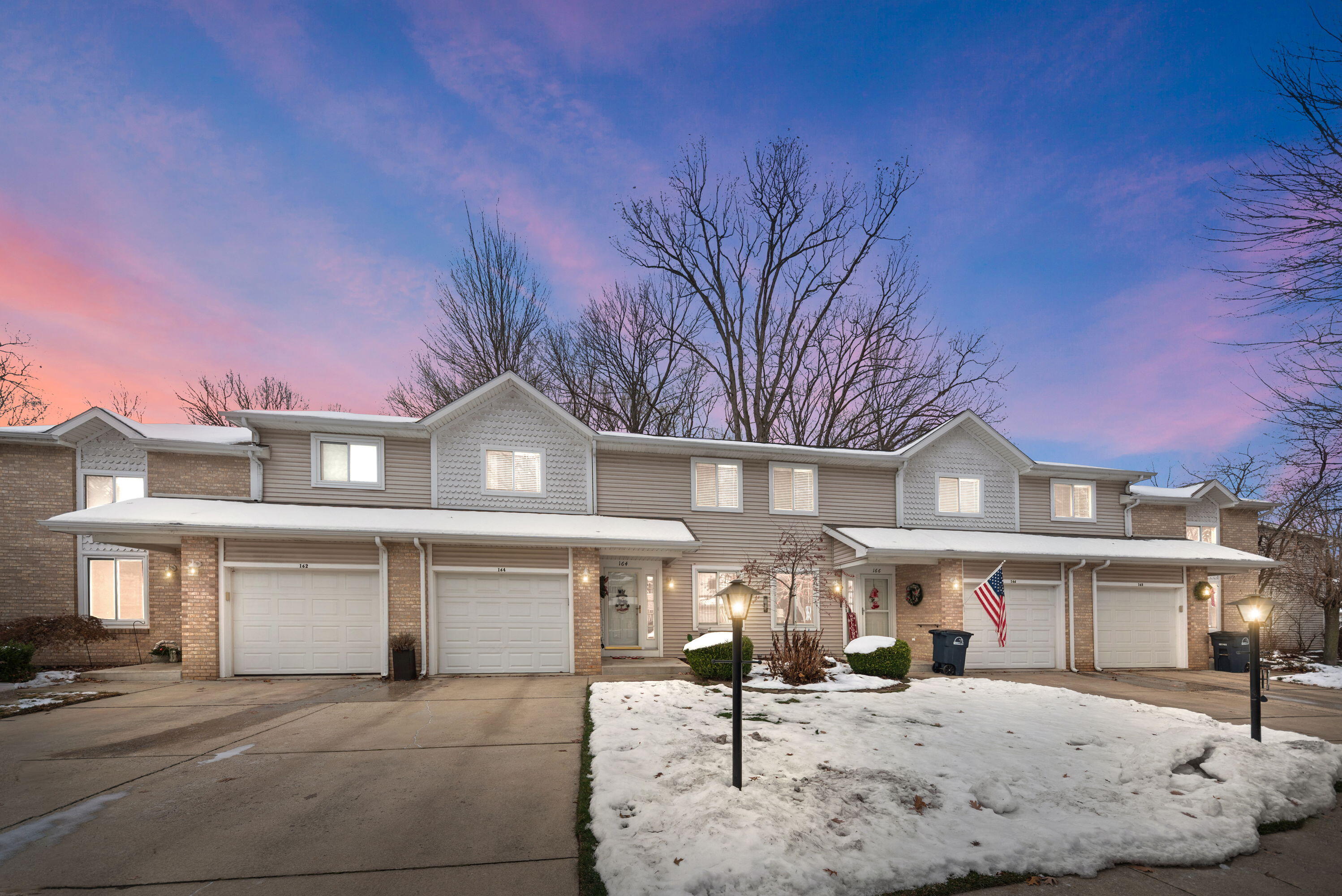162 Indian Rdg Drive Michigan City, IN 46360 - Photo 1 of 17 a front view of a house with a yard