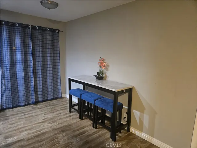 a view of livingroom with furniture and wooden floor
