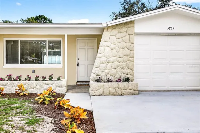 a view of bathroom with a tub and shower