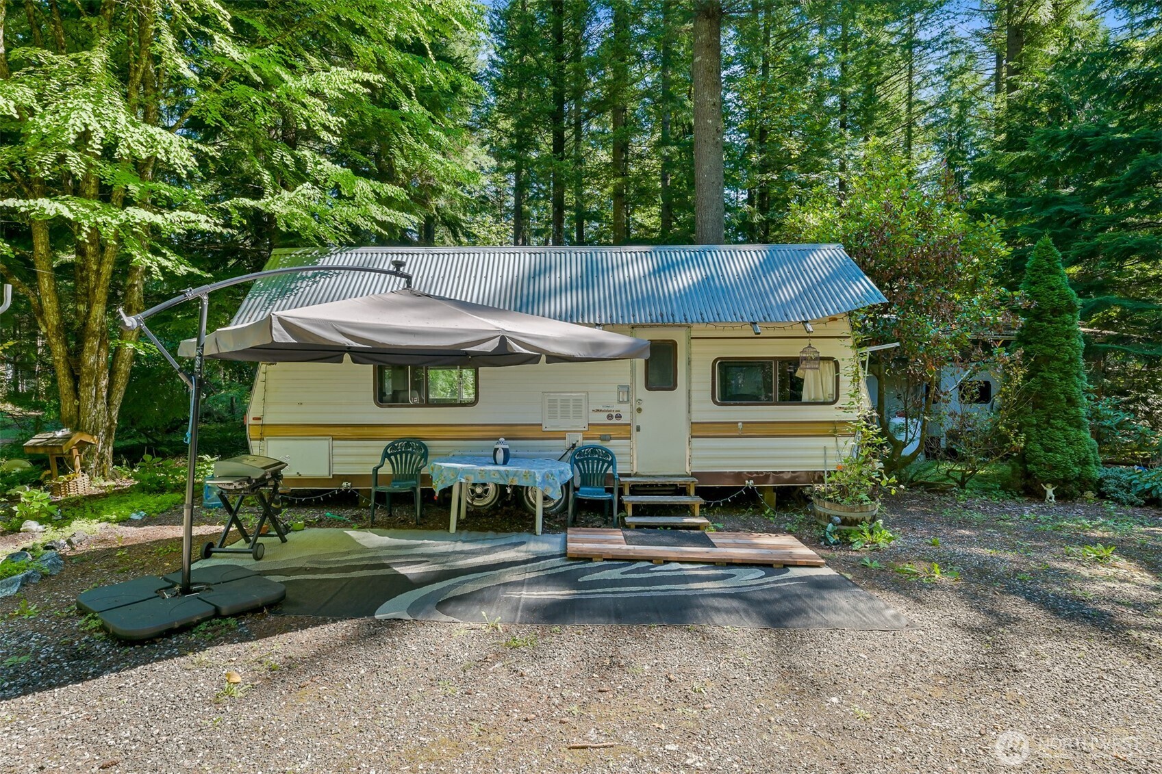 3013 Tower Road Maple Falls, WA 98266 - Photo 1 of 38 a view of a house with a yard and sitting area