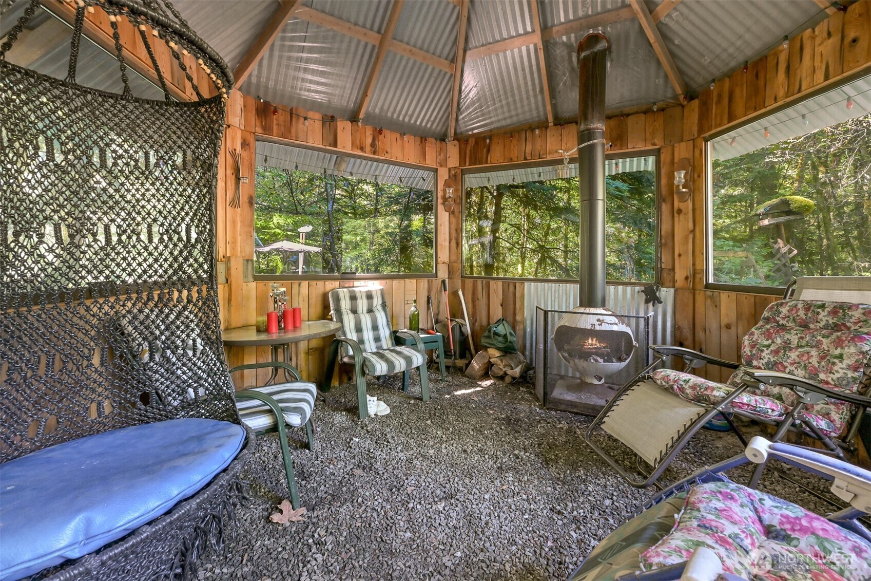 3013 Tower Road Maple Falls, WA 98266 - Photo 11 of 38 a backyard of a house with table and chairs