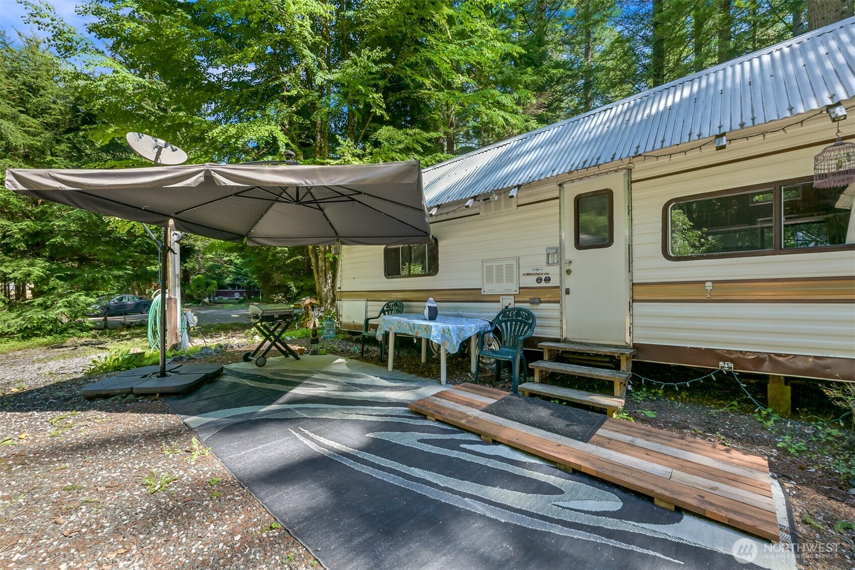 3013 Tower Road Maple Falls, WA 98266 - Photo 13 of 38 a view of a house with backyard and sitting area