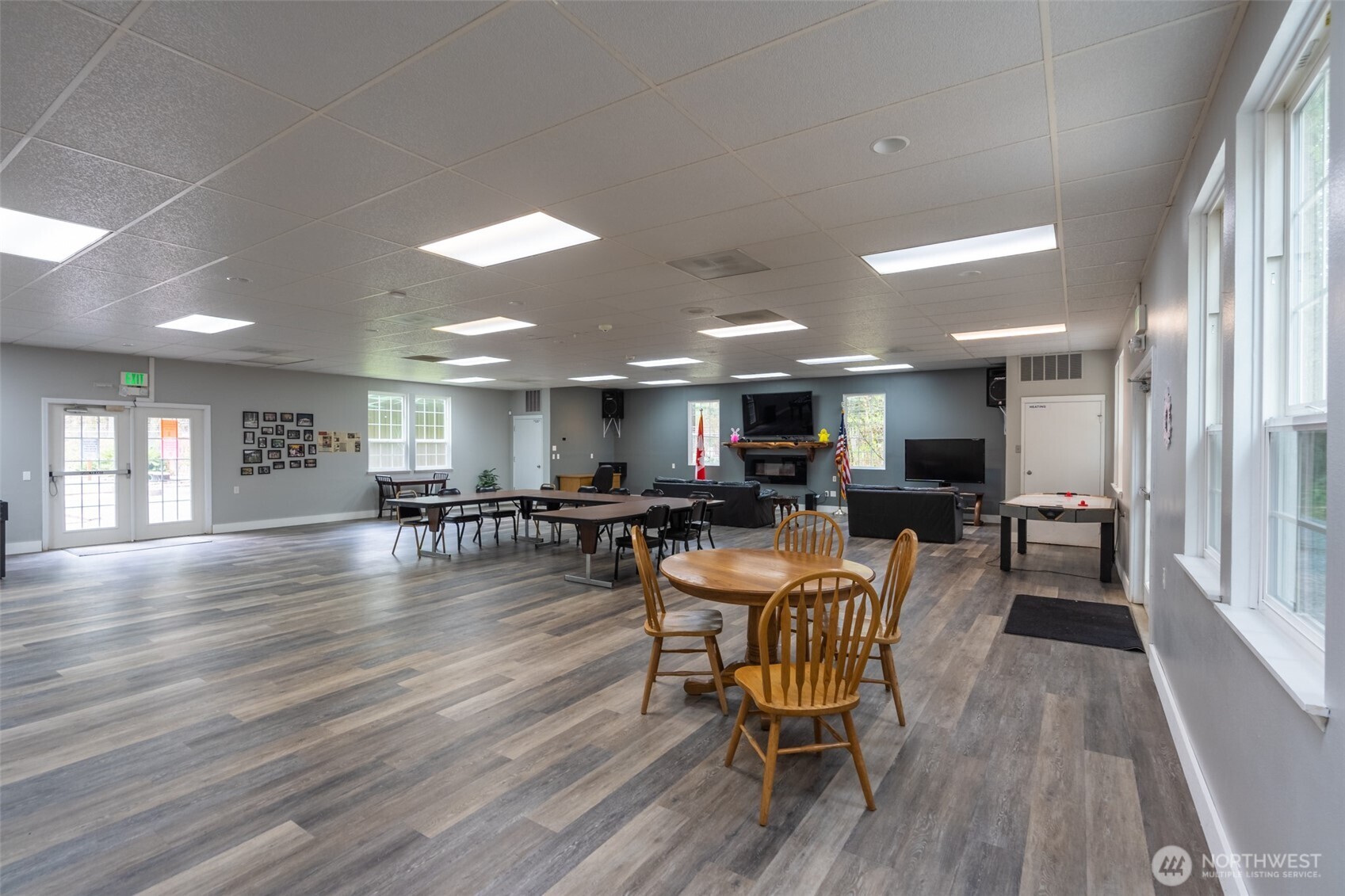 3013 Tower Road Maple Falls, WA 98266 - Photo 21 of 38 a view of a dining room with furniture and wooden floor