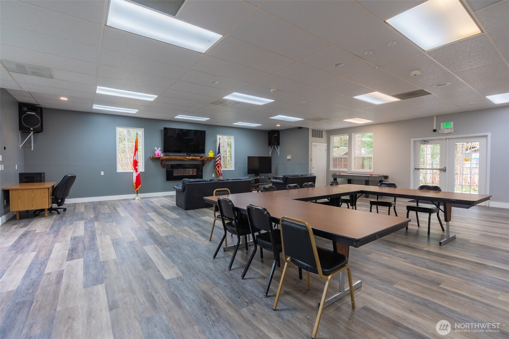 3013 Tower Road Maple Falls, WA 98266 - Photo 22 of 38 a large dining space with furniture a rug and wooden floor