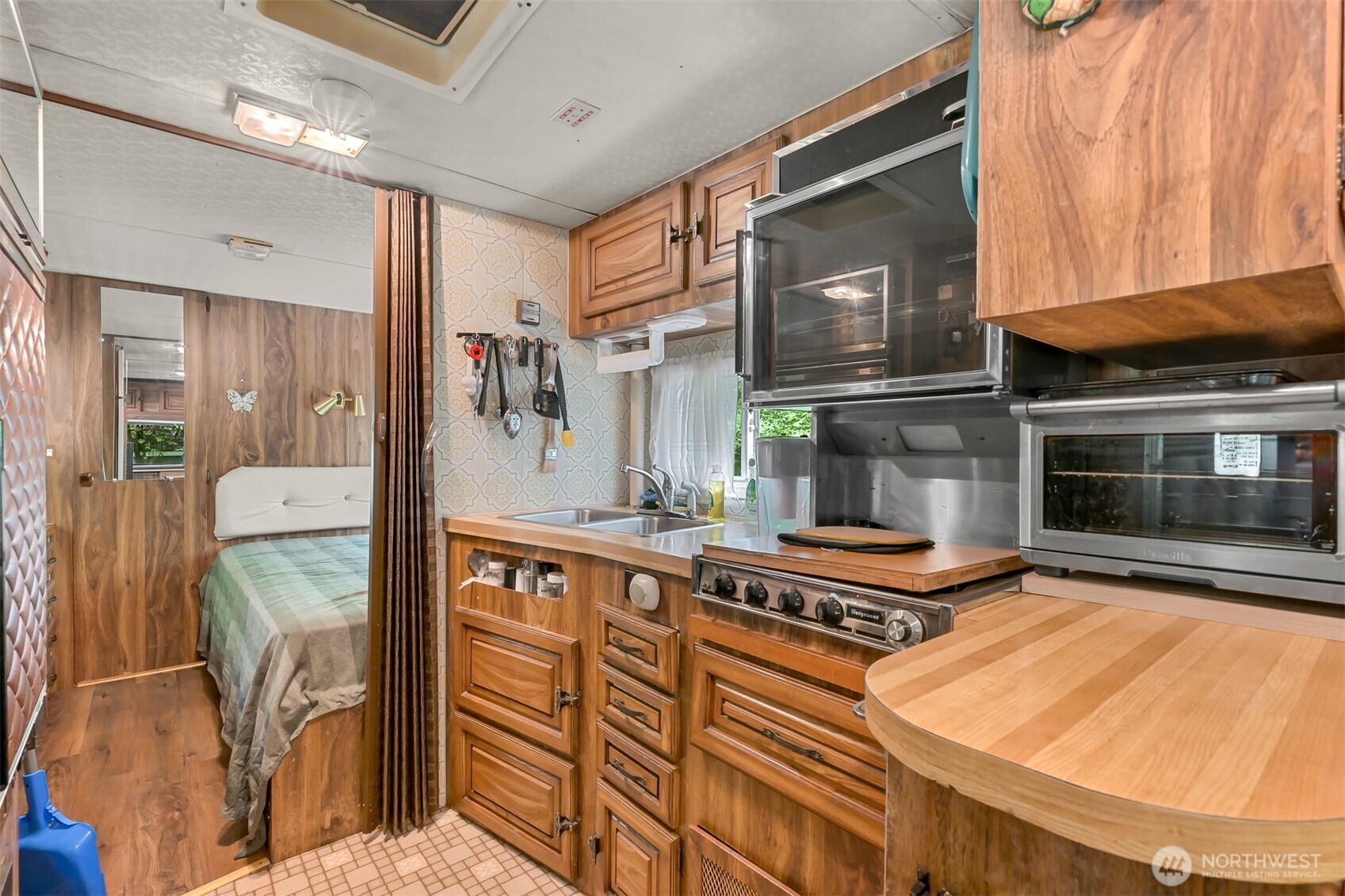 3013 Tower Road Maple Falls, WA 98266 - Photo 3 of 38 a kitchen with stainless steel appliances granite countertop a refrigerator and a stove top oven