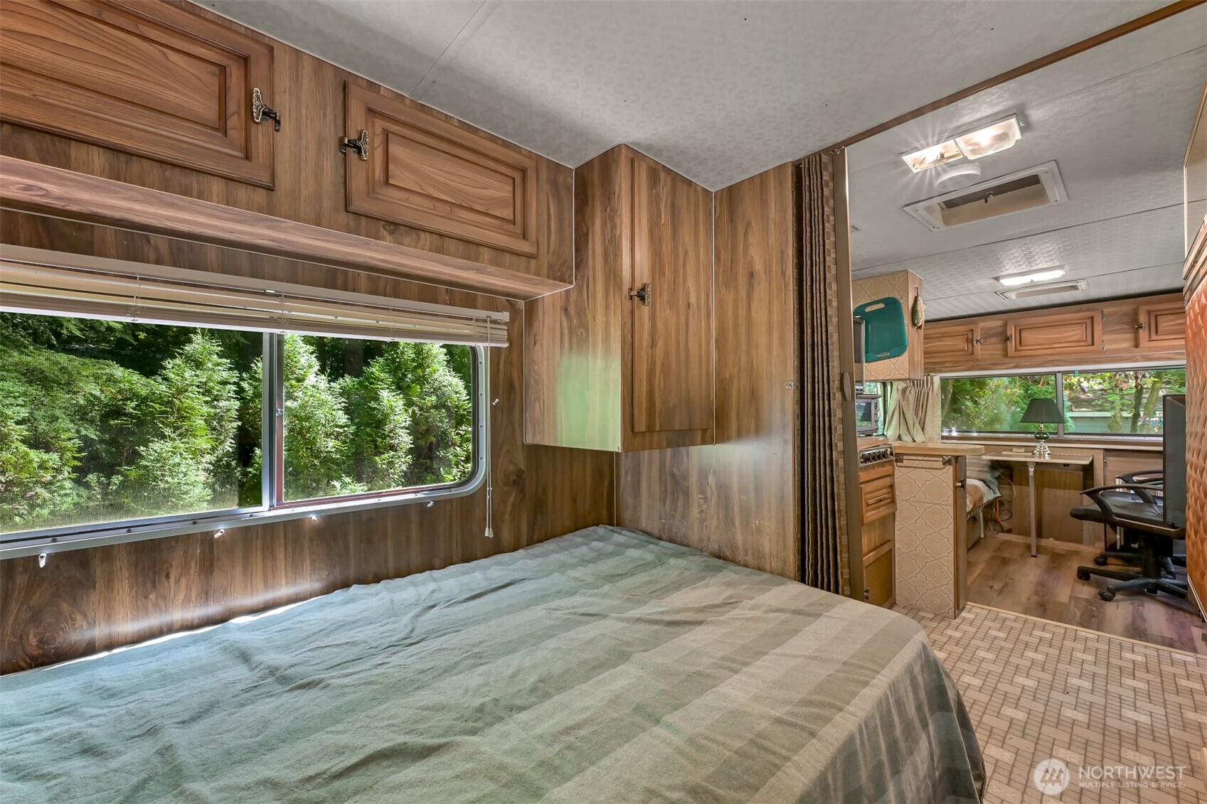 3013 Tower Road Maple Falls, WA 98266 - Photo 8 of 38 a bedroom with a bed and large window