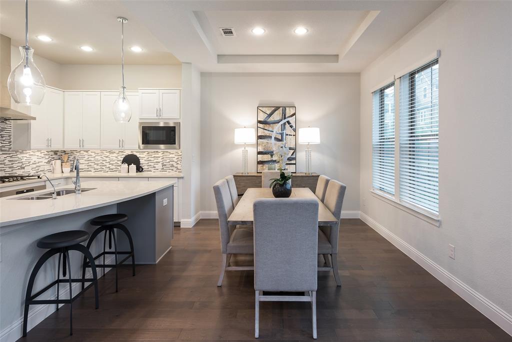 1115 Manacor Lane Dallas, TX 75212 - Photo 16 of 28 a dining room with furniture a window and kitchen view