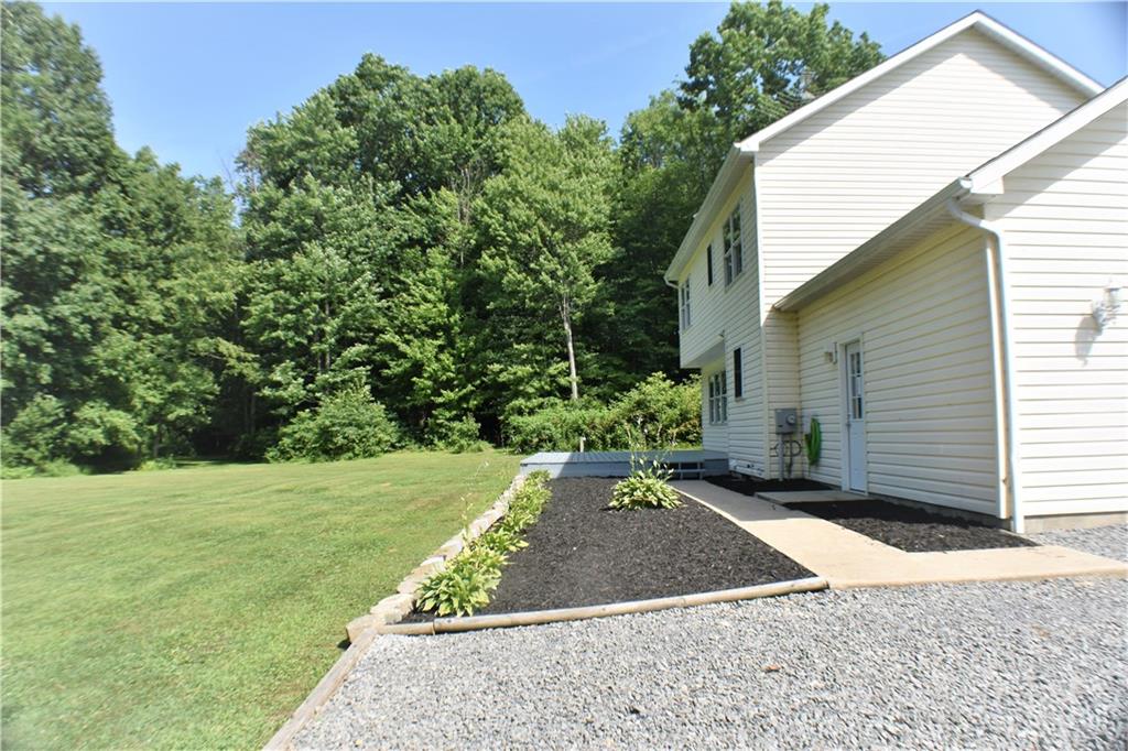 541 Millburn Road Mercer, PA 16137 - Photo 4 of 25 The peaceful setting of 6.93 acres is comprise of yard, pond and woods!! Something for everyone.