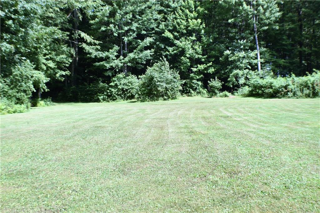 541 Millburn Road Mercer, PA 16137 - Photo 8 of 25 The yard backs up to thick woods with trails for walking or using a 4 wheeler. Remember - it's 6.93 acres!