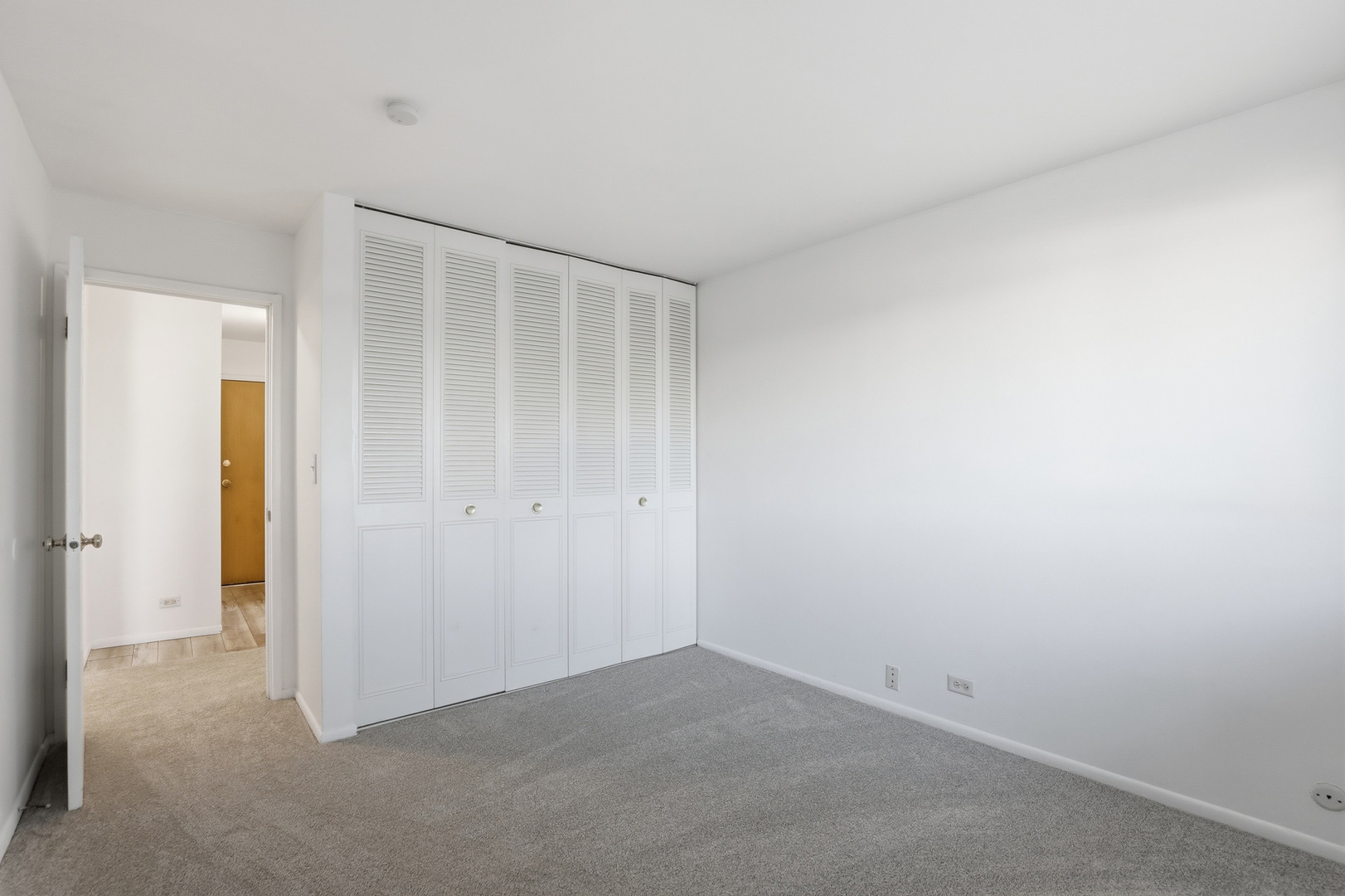 1375 Rebecca Drive, Unit 213 Hoffman Estates, IL 60169 - Photo 15 of 21 a view of an empty room