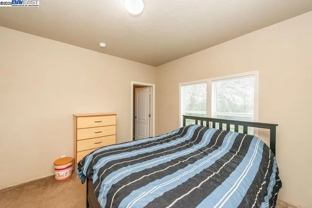 a backyard of a house with a yard and lake view