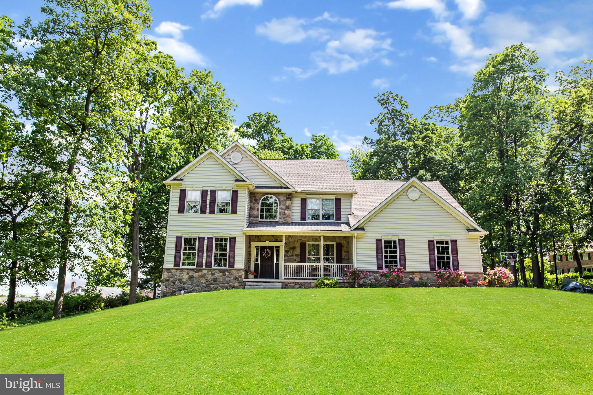 216 Blooming Grove Road Hanover, PA 17331 - Photo 1 of 60 a front view of a house with a garden