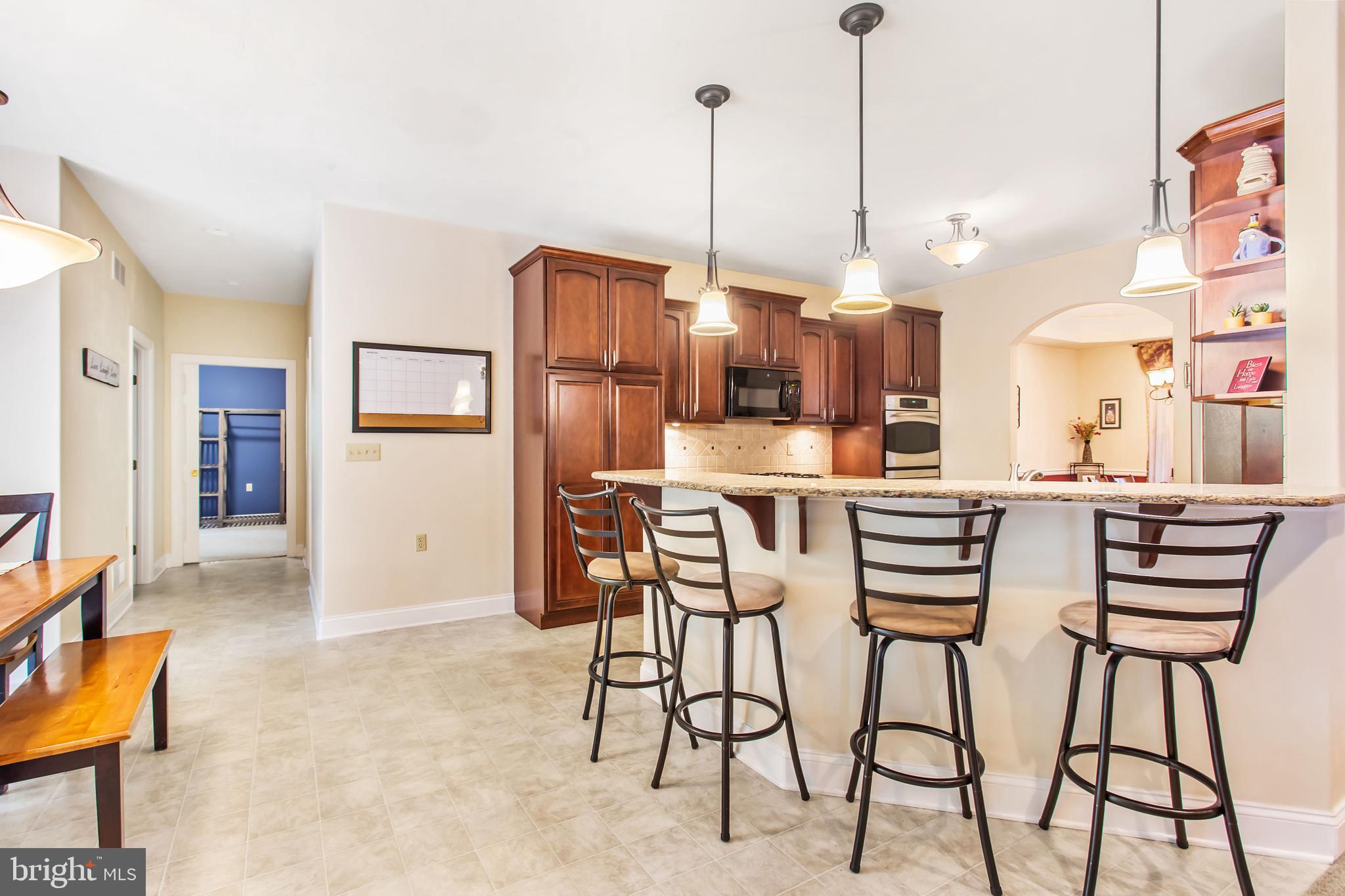 216 Blooming Grove Road Hanover, PA 17331 - Photo 11 of 60 a view of a kitchen with furniture and a area