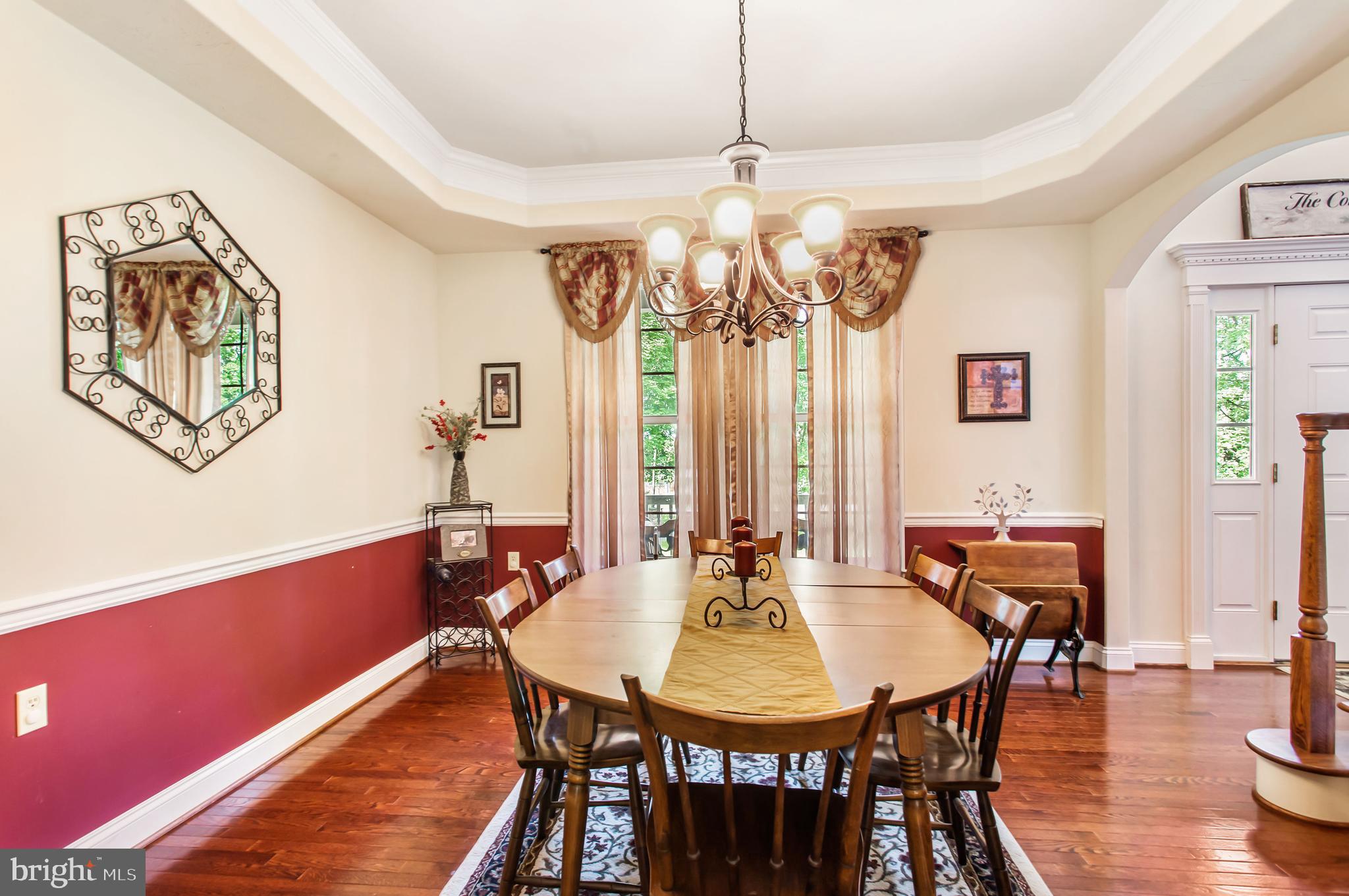 216 Blooming Grove Road Hanover, PA 17331 - Photo 16 of 60 a view of a dining room with furniture wooden floor and chandelier