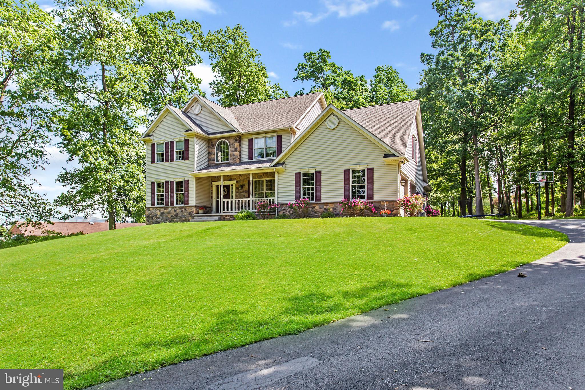 216 Blooming Grove Road Hanover, PA 17331 - Photo 3 of 60 a view of a house with a yard and potted plants