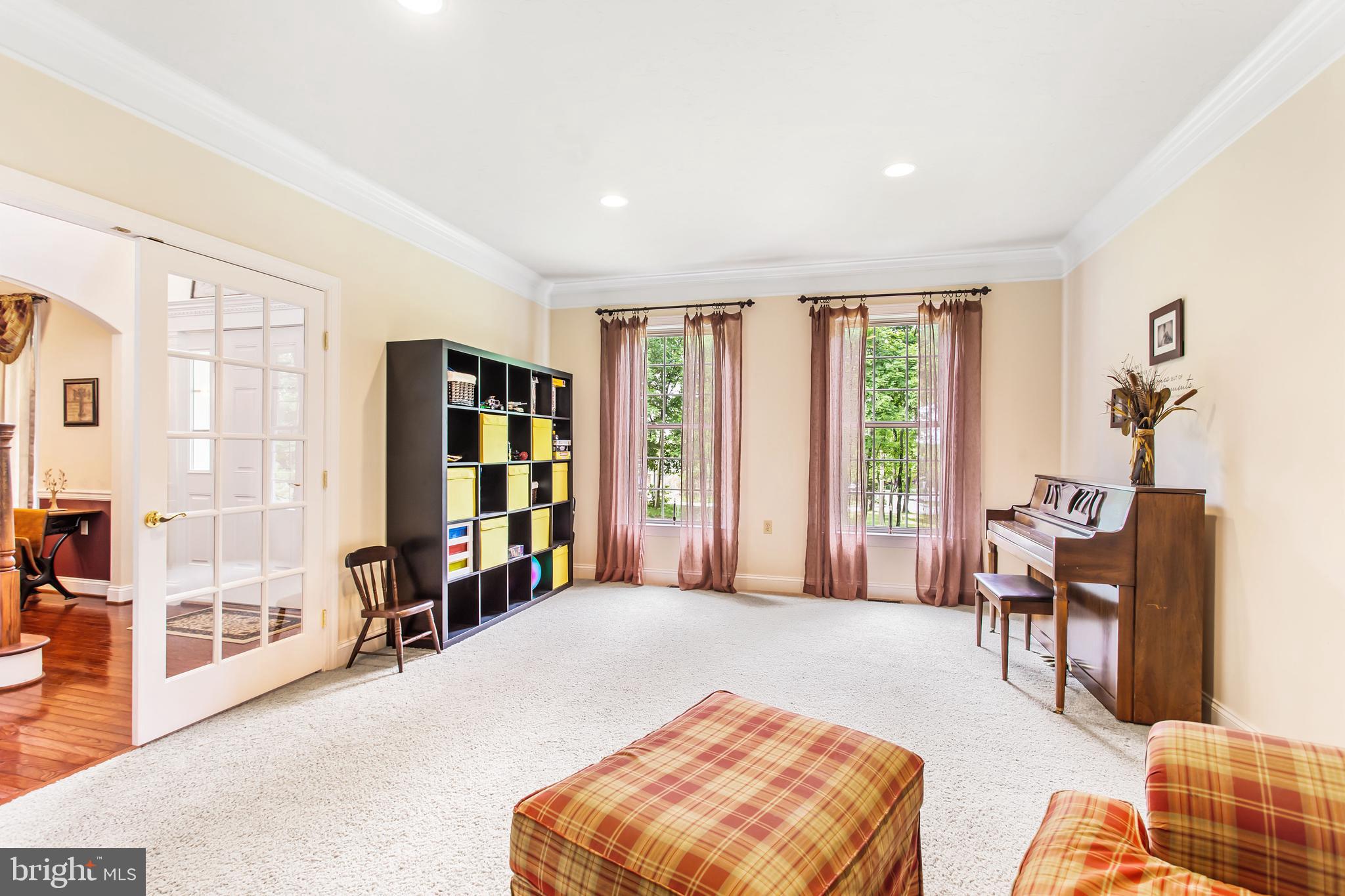 216 Blooming Grove Road Hanover, PA 17331 - Photo 27 of 60 a spacious bedroom with a bed and a couch