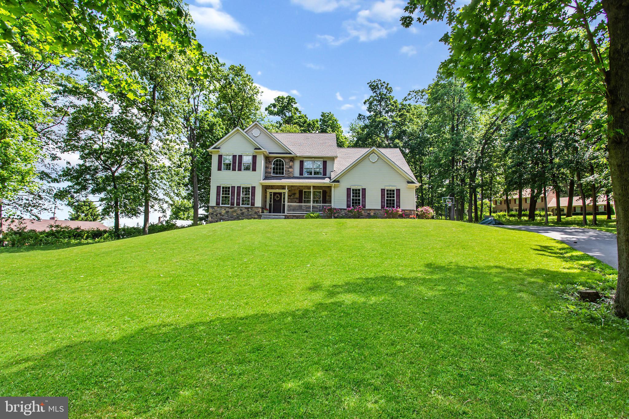 216 Blooming Grove Road Hanover, PA 17331 - Photo 4 of 60 a front view of a house with garden