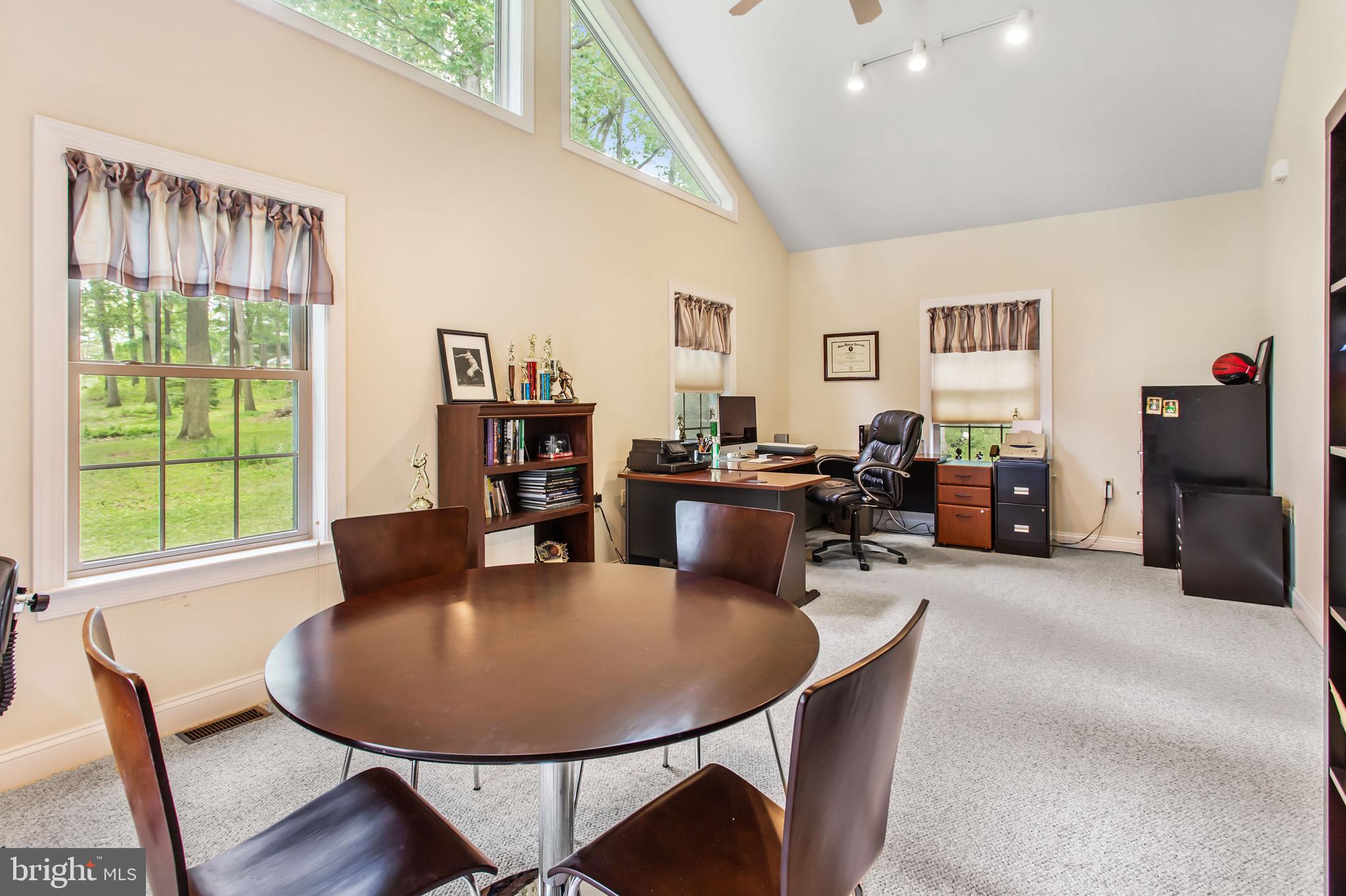 216 Blooming Grove Road Hanover, PA 17331 - Photo 32 of 60 a living room with furniture a window and a dining table