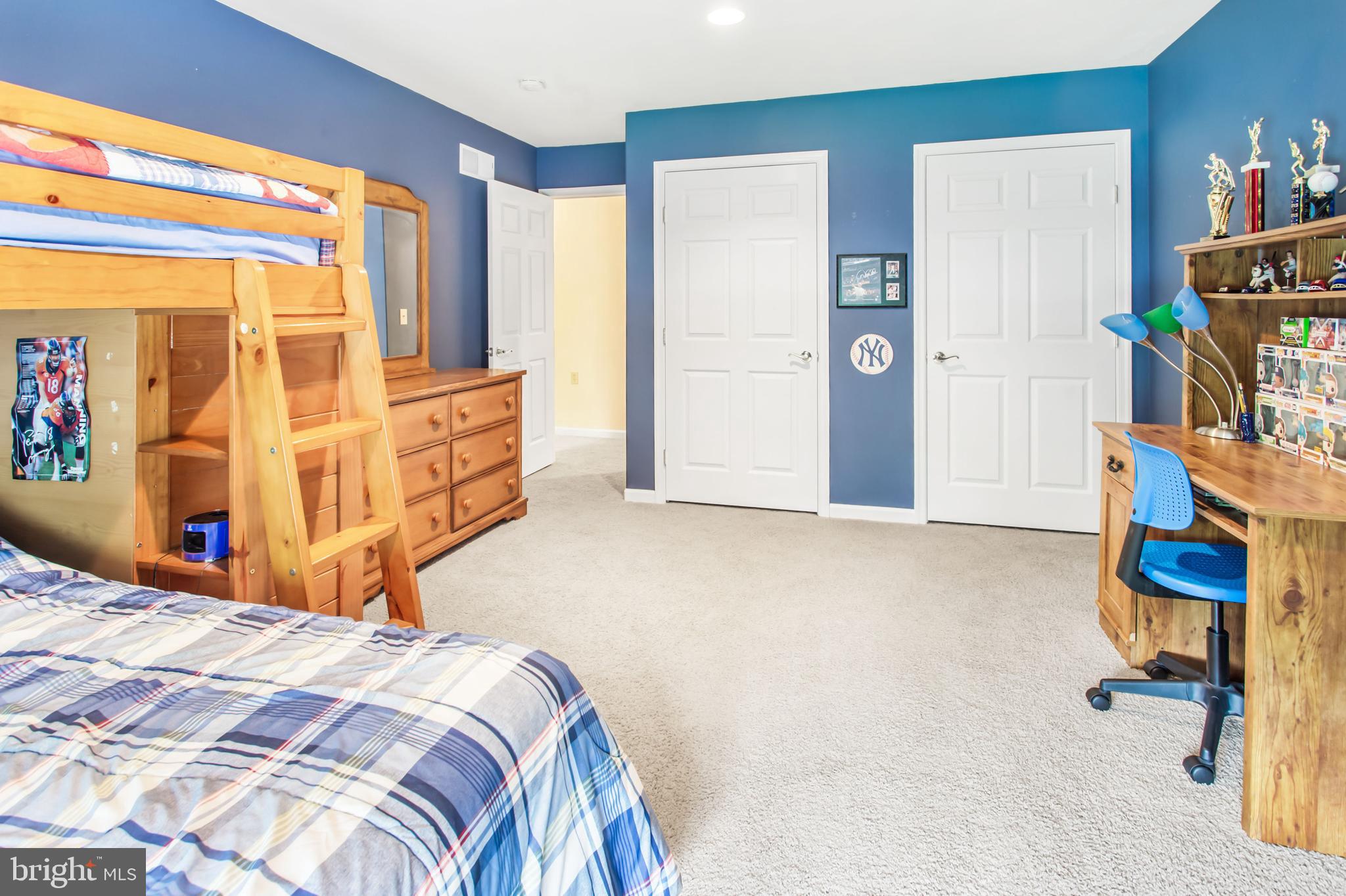 216 Blooming Grove Road Hanover, PA 17331 - Photo 46 of 60 a bedroom with a bed and a walk in closet