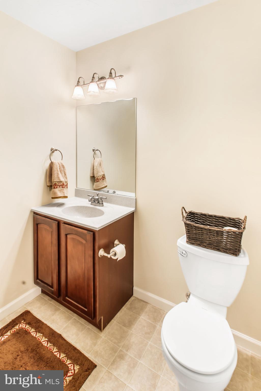 216 Blooming Grove Road Hanover, PA 17331 - Photo 54 of 60 a bathroom with a toilet sink and mirror