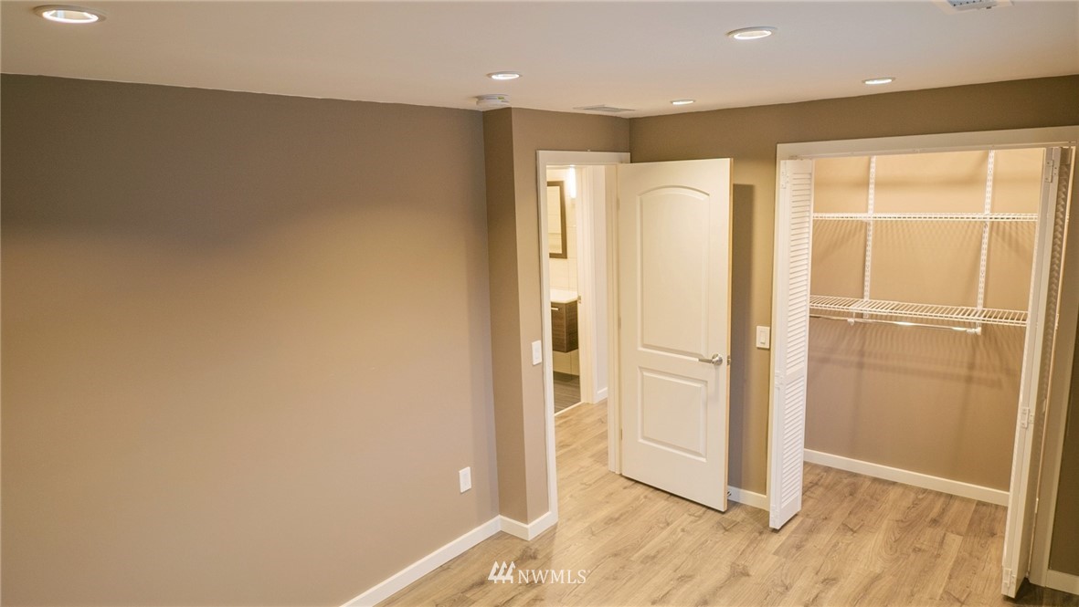 3436 Southeast 5th Street Renton, WA 98058 - Photo 15 of 28 a view of a refrigerator in kitchen and an empty room