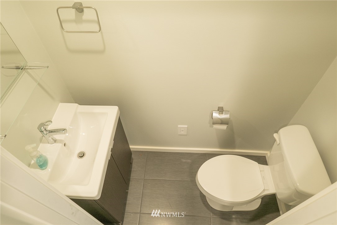 3436 Southeast 5th Street Renton, WA 98058 - Photo 20 of 28 a bathroom with a sink and a mirror