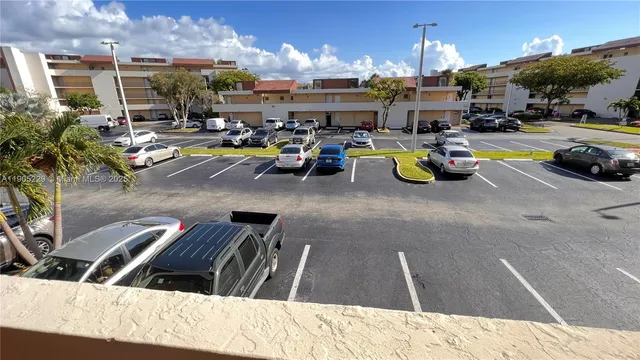 a view of a street with houses on both side