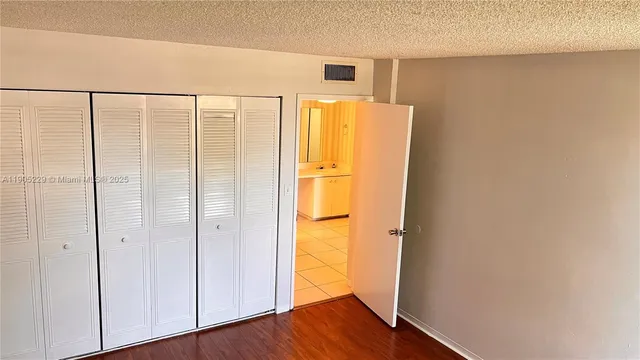 a view of walk in closet with window