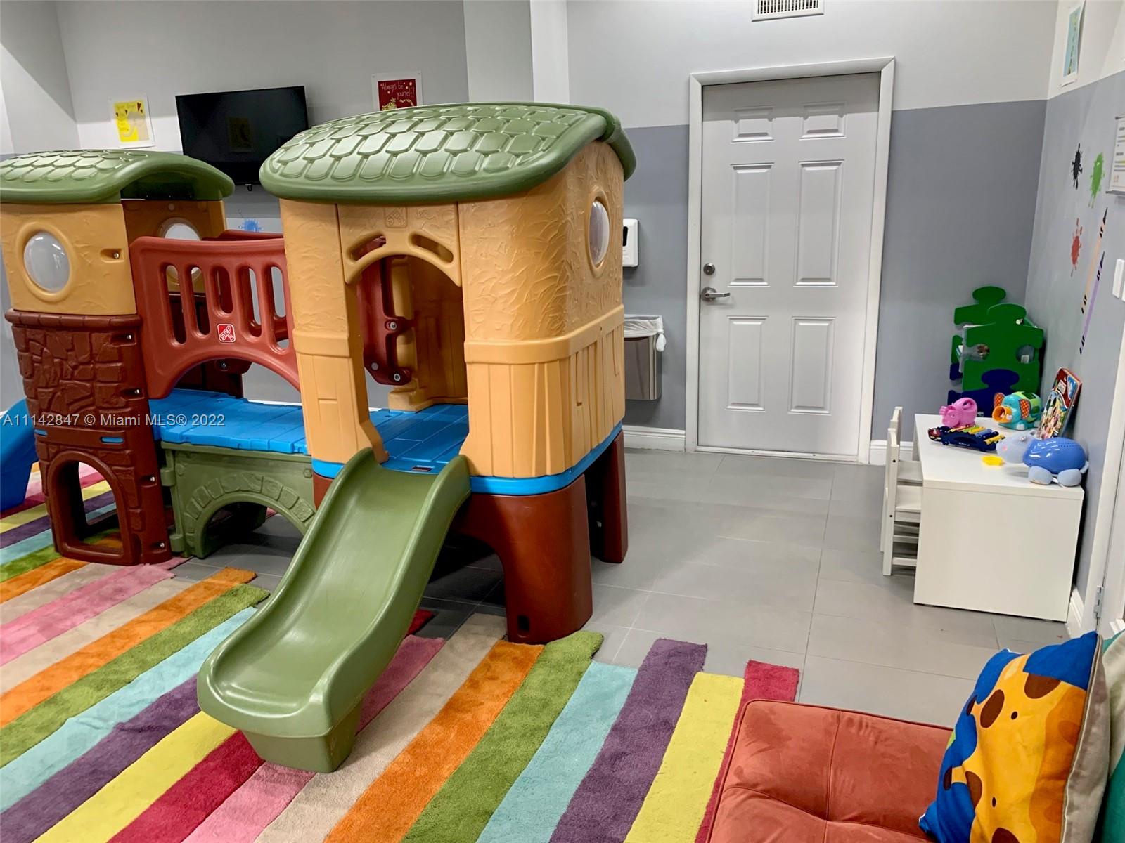 1200 Brickell Bay Drive, Unit 1812 Miami, FL 33131 - Photo 21 of 24 a living room filled with furniture and a couch