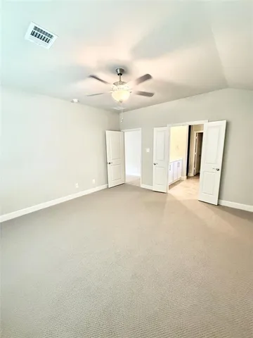 a view of a kitchen with kitchen island a sink wooden floor and living room view