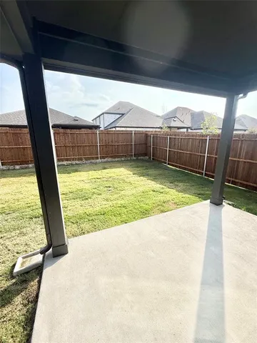 a bathroom with a tub and a shower