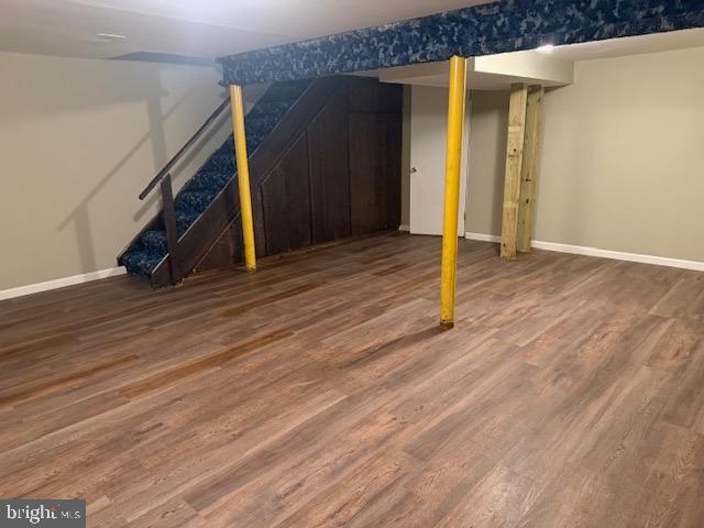 3304 Golf View Drive Newark, DE 19702 - Photo 17 of 18 a view of a hallway with wooden floor and stairs