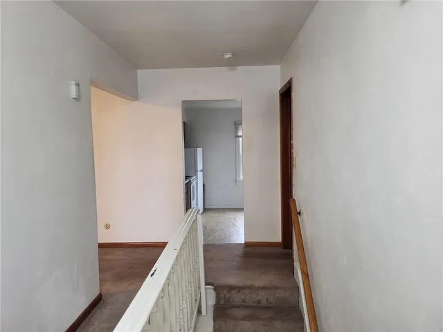 a view of a hallway to the house