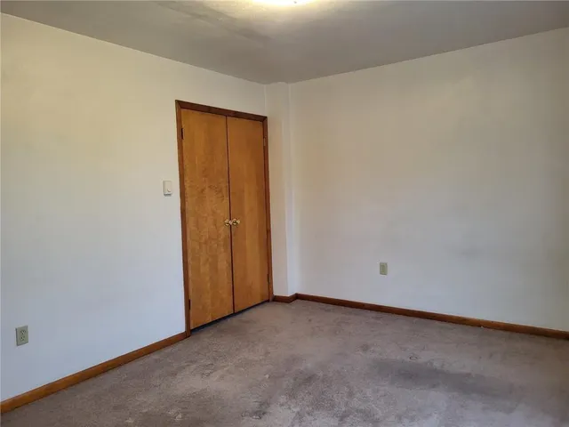 an empty room with closet
