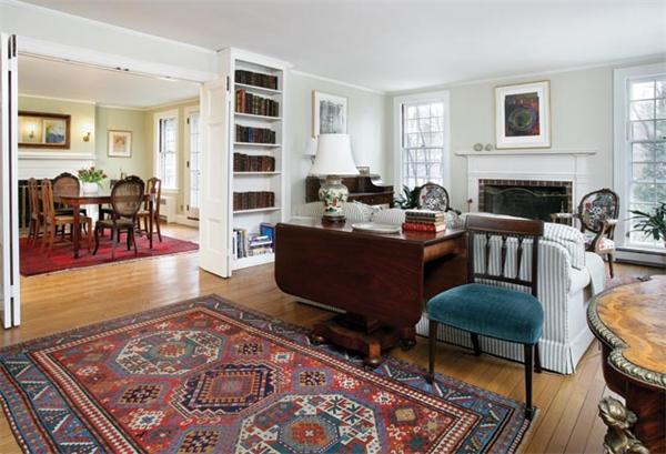 21 Fairmount Street Brookline, MA 02445 - Photo 2 of 10 a living room with furniture and a fireplace