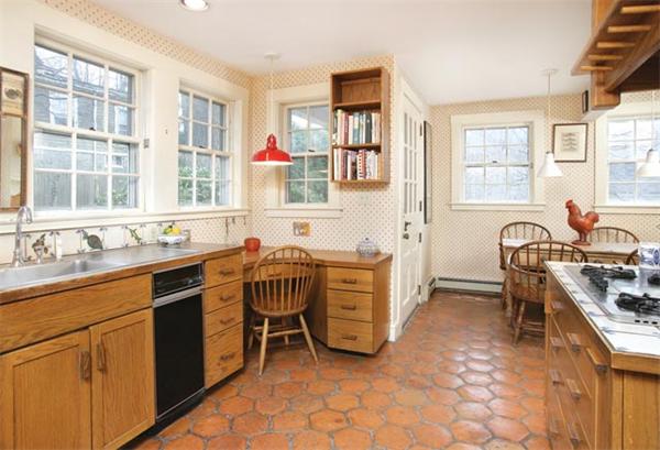 21 Fairmount Street Brookline, MA 02445 - Photo 4 of 10 a spacious kitchen with stainless steel appliances granite countertop sink window and white cabinets