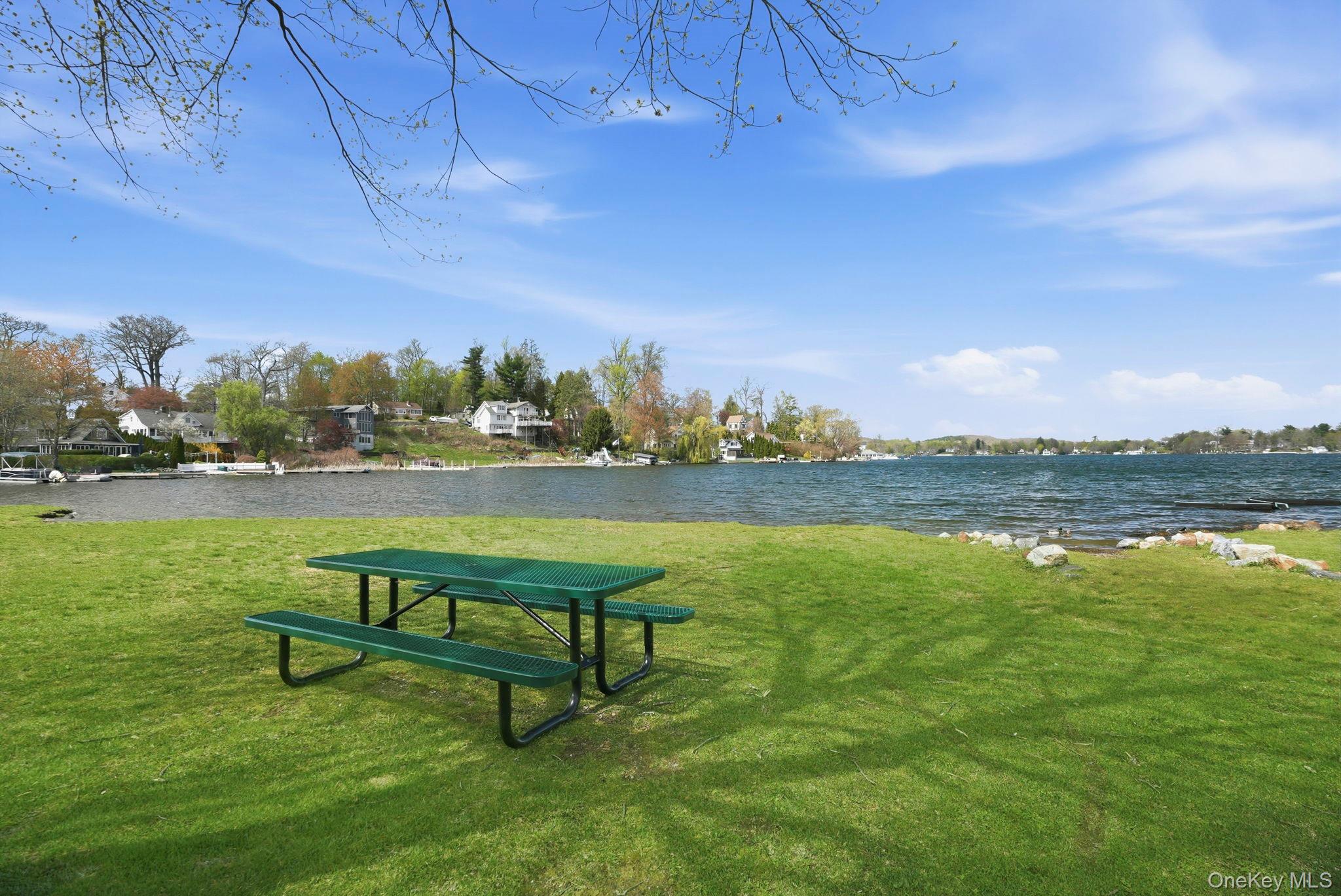 4 Marina Drive, Unit D2 Mahopac, NY 10541 - Photo 28 of 39 Grassed outdoor area with a picnic table and waterside views