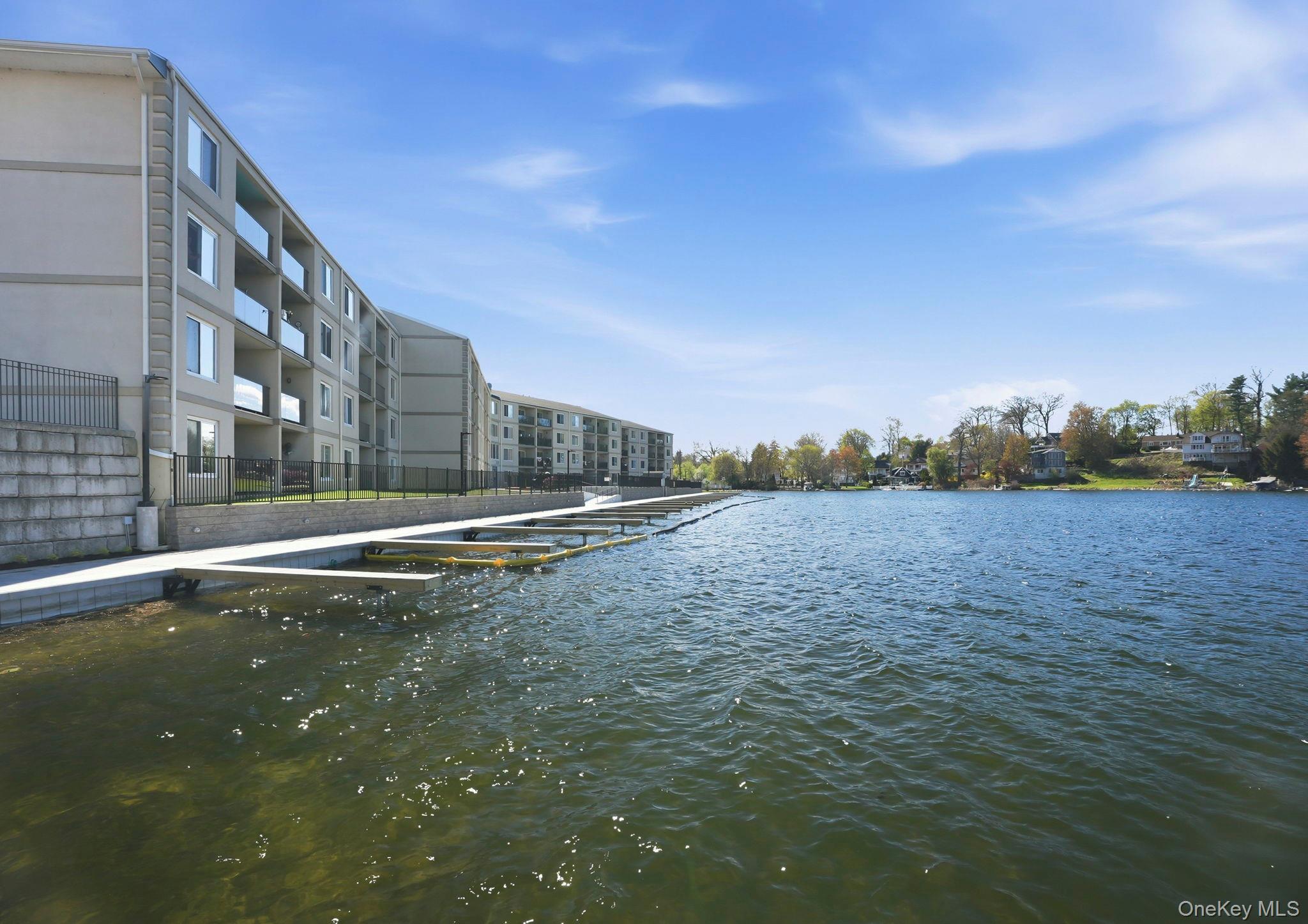 4 Marina Drive, Unit D2 Mahopac, NY 10541 - Photo 32 of 39 The property features a waterfront location with private docks and expansive water views