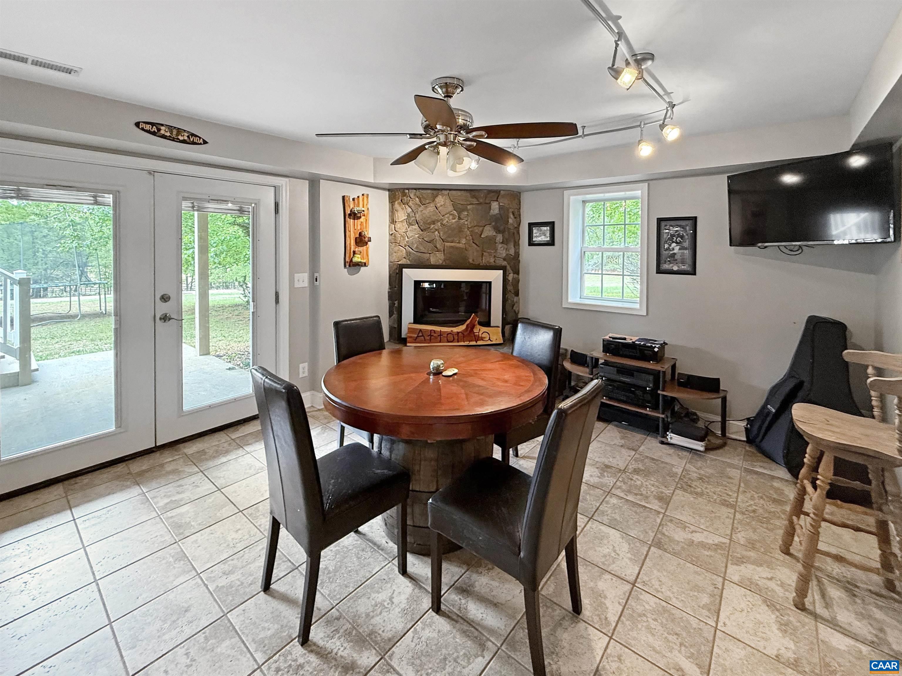 1646 Pughs Store Road Afton, VA 22920 - Photo 36 of 52 a view of a dining room with furniture window and wooden floor
