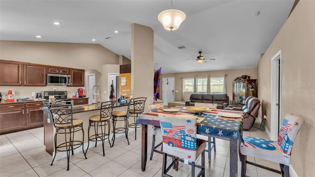 39360 Sparkman Road Dade City, FL 33525 - Photo 13 of 40 a view of a dining room with furniture