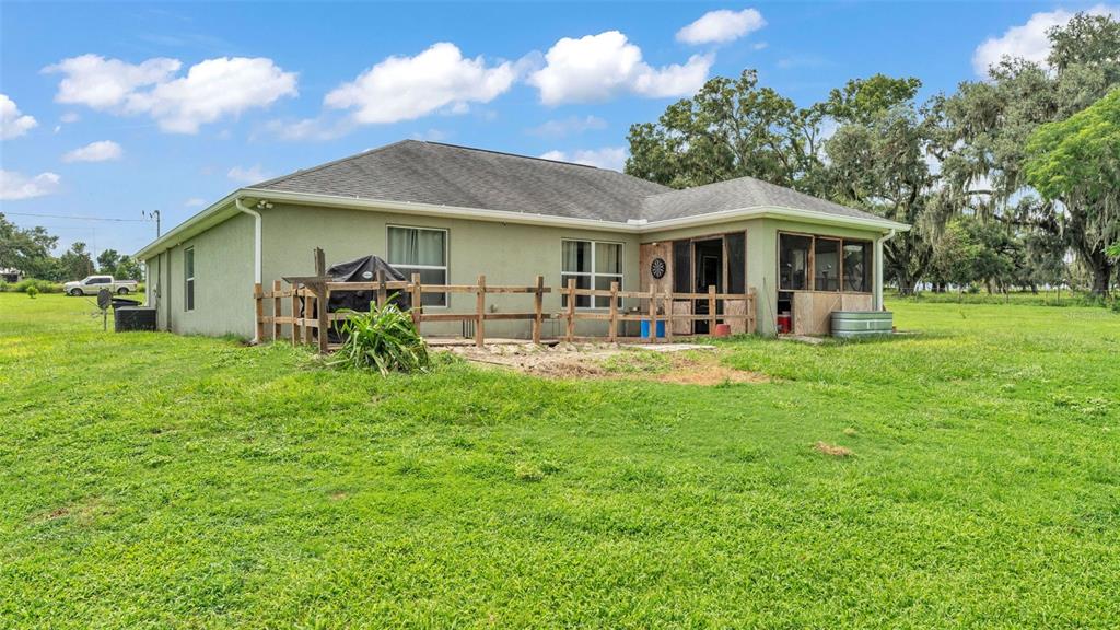 39360 Sparkman Road Dade City, FL 33525 - Photo 36 of 40 a front view of a house with garden