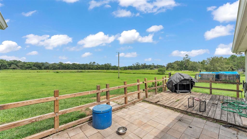39360 Sparkman Road Dade City, FL 33525 - Photo 38 of 40 a view of a terrace with lawn chairs