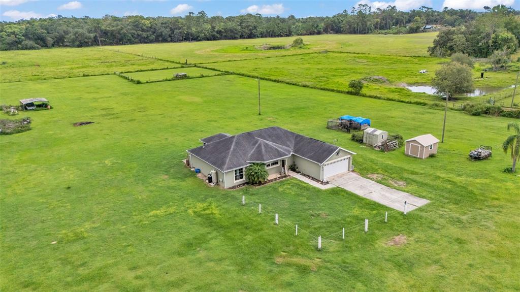 39360 Sparkman Road Dade City, FL 33525 - Photo 6 of 40 a view of a house with a yard