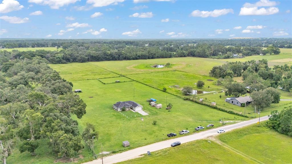 39360 Sparkman Road Dade City, FL 33525 - Photo 9 of 40 a view of an outdoor space and a yard