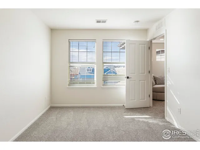 a bathroom with a shower curtain and a curtain